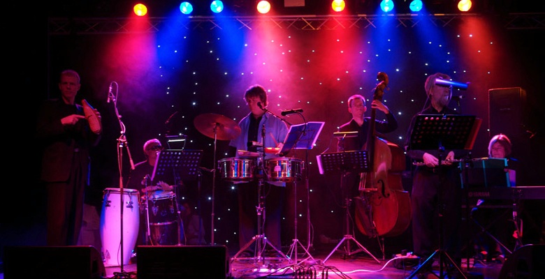 Live Latin Charanga Band Cafecito playing at a corporate event in Battersea Park