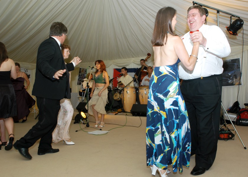 Guests dancing to live latin band Jan y su Salsa at a corporate party in Gloucestershire. Fronted by singer Taide